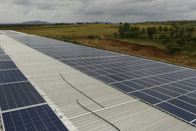 Rooftop solar panel installation on commercial building